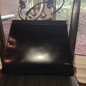 A. Bellucci black leather handbag